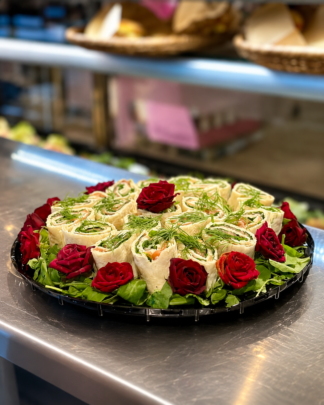 Tortilla pinwheel platter with red roses — Spisa bespoke catering